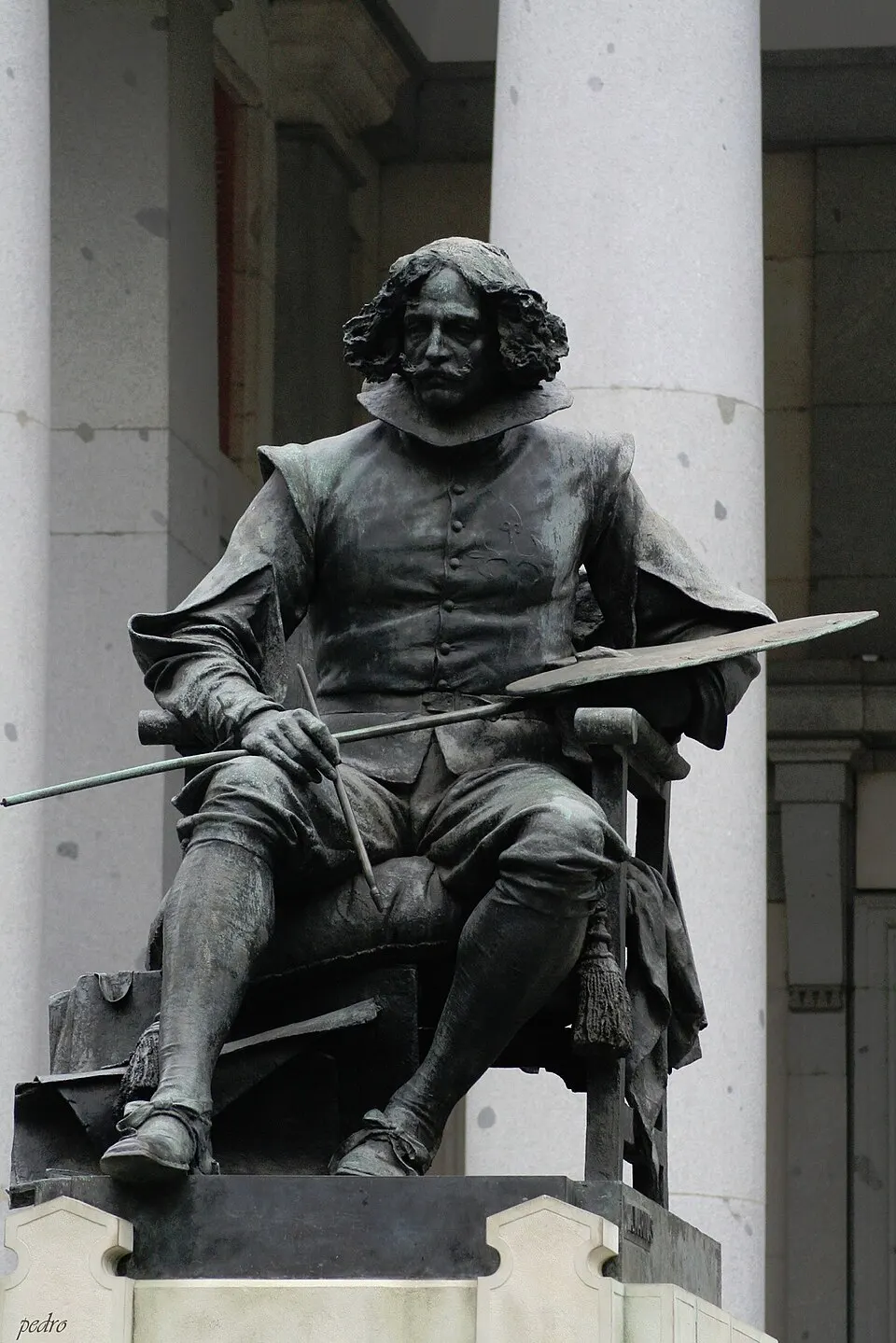 The Velázquez Gate of the Prado Museum with the statue of the painter